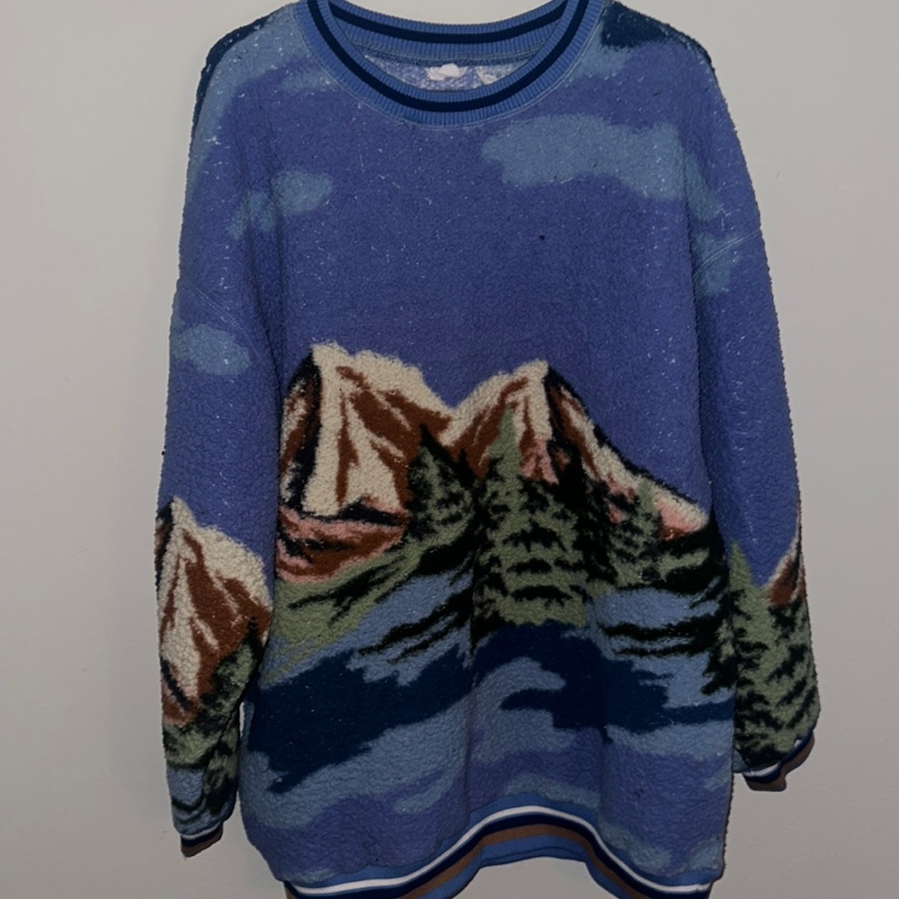Out from under sweater
